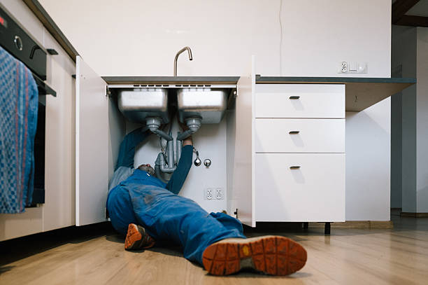 Professional Drain Cleaning technician working in Selden, NY